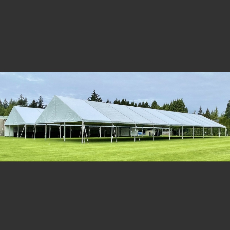 Frame tent, Education event in Vancouver - St George's School | guests 401~500 | (2) 50 x 150 white tops w/ clear gables. We set this up every year for graduations. Canada Scaffold does the staging, Pedersen's Event Rentals do the chairs and linens.| Elevation Tent Rentals