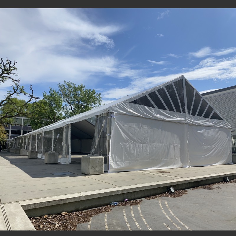 Frame tent, Education event in Vancouver - UBC | guests 101~200 | 40 x 120 maxi frame w/ sunburst gables. one of multiple tents set up twice a year for the UBC graduations. | Elevation Tent Rentals