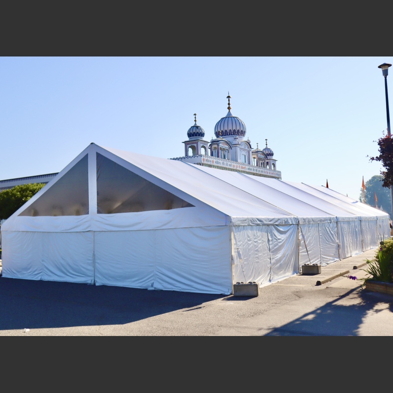 Frame tent, Wedding event in Vancouver - | guests 201~300 | 40 x 100 white top with clear gables. This was for an indian wedding at the temple on Westminster Hwy| Elevation Tent Rentals
